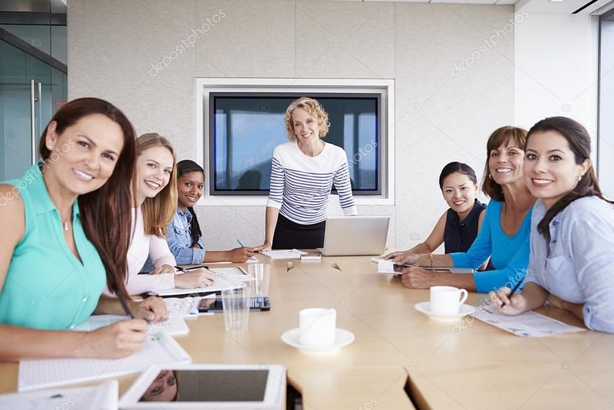 depositphotos 102808880 stock photo group of businesswomen on meeting